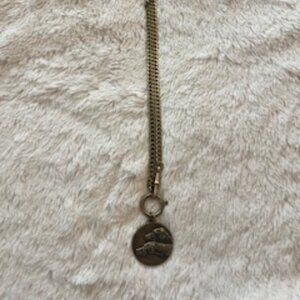 Vintage brass necklace with dog charm